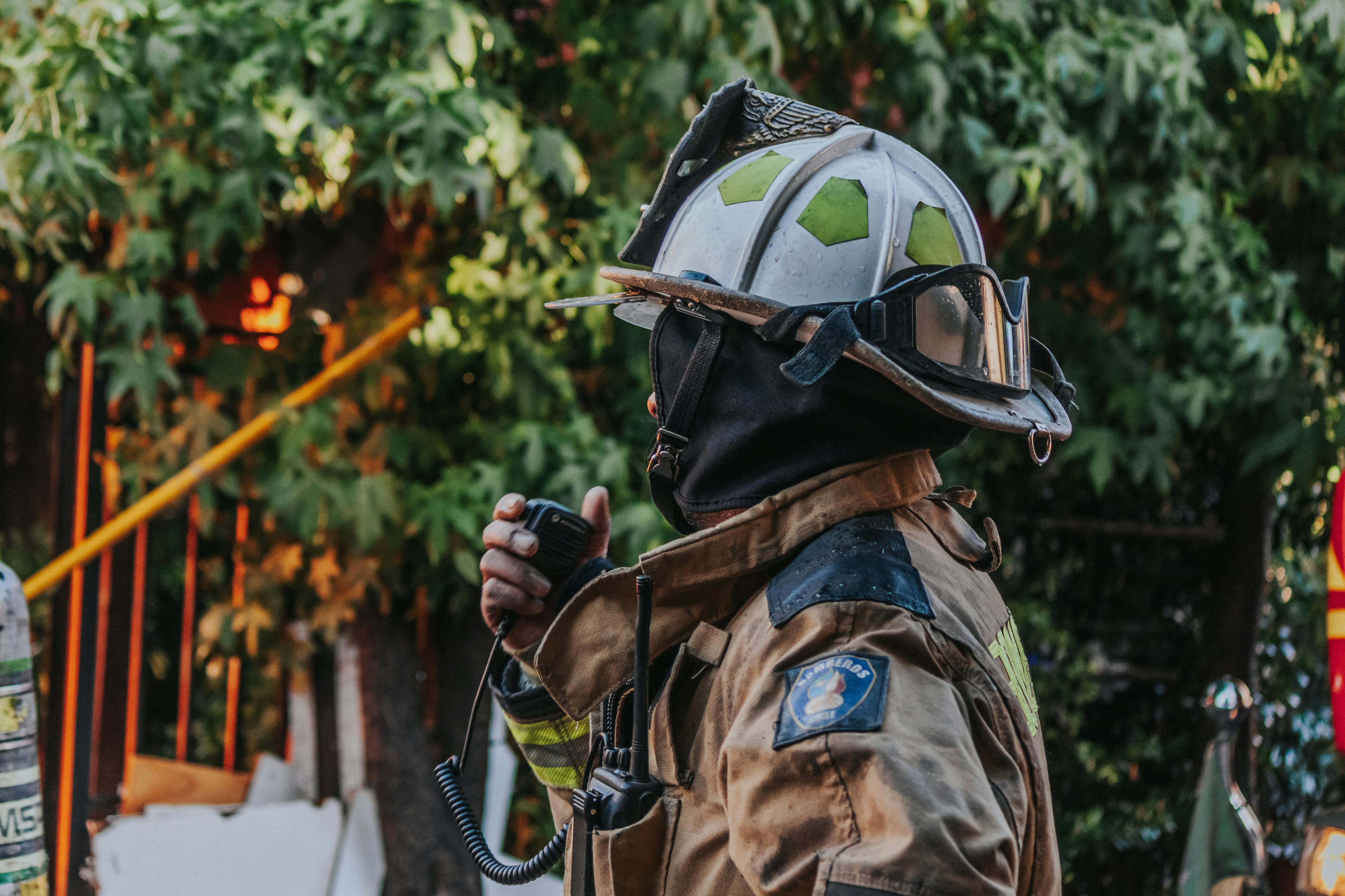 firefighter talking on radio