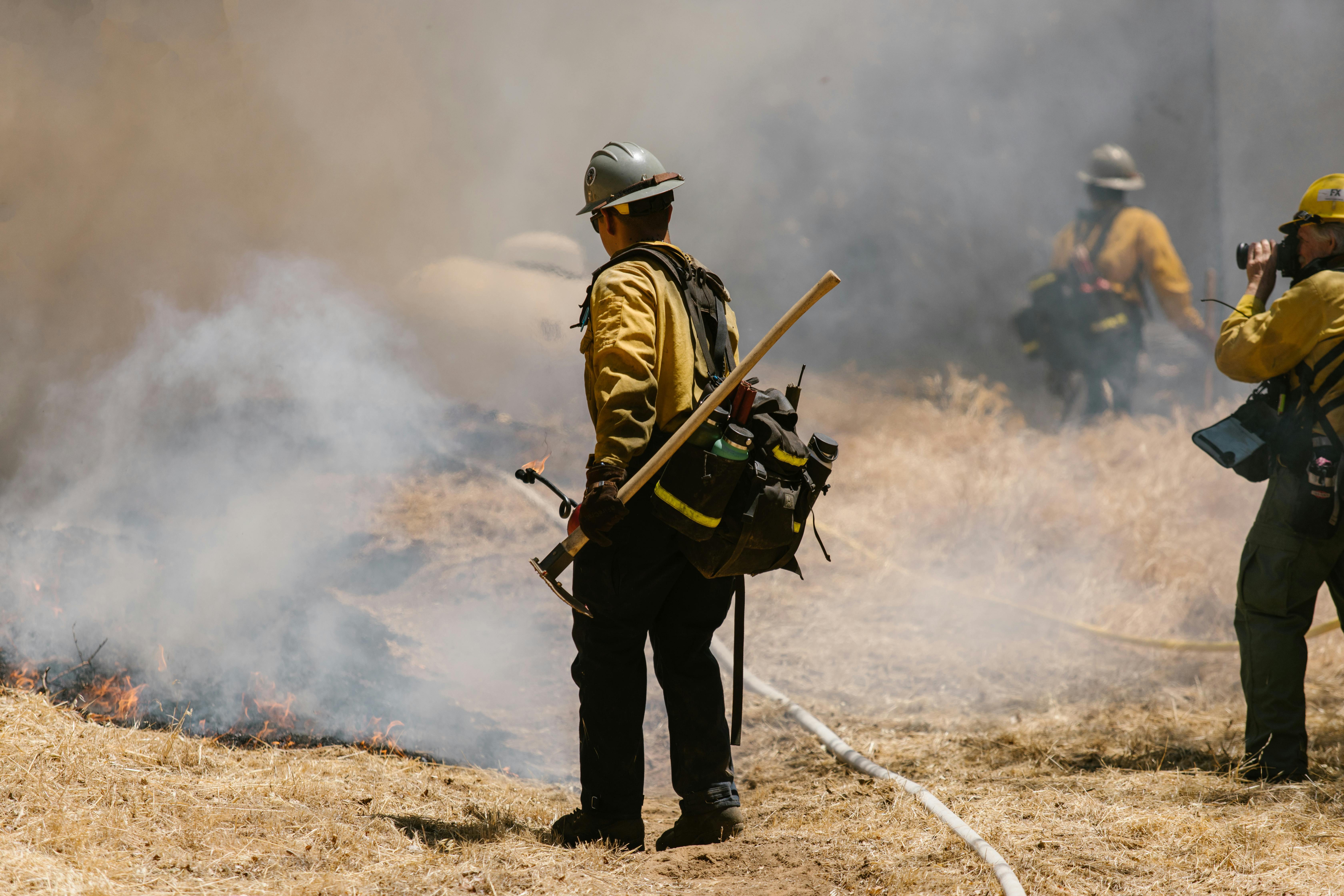 A Firefighter Holding a Gogui Multi tool Firepenny Vallfirest